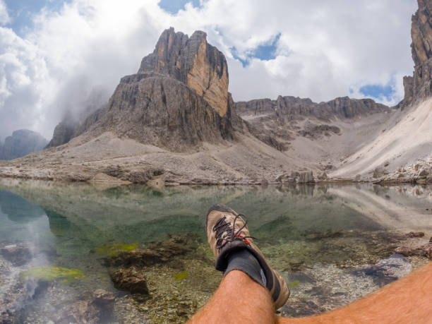 istock Relaxing by a Crystal-Clear Mountain Lake 2186907844