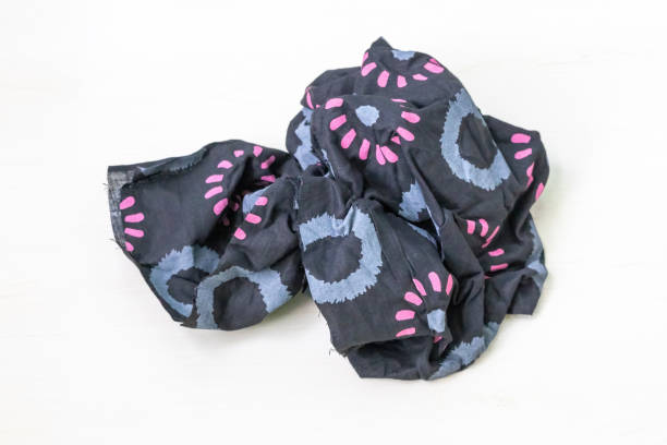 istock Beautiful batik cloth pieces with floral prints, isolated on a white background. 2186918458