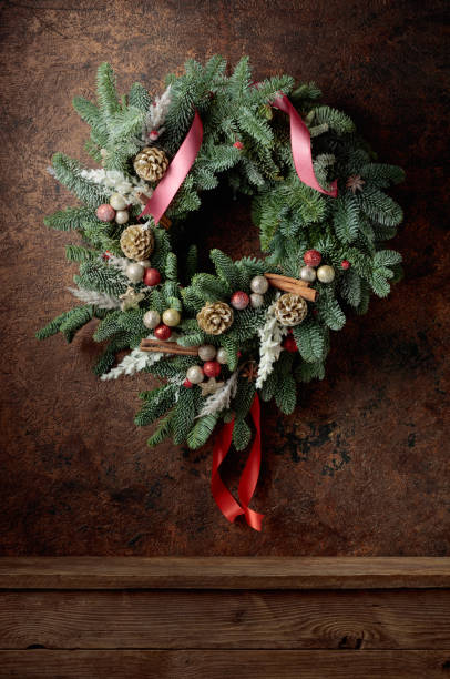 istock Christmas wreath on a brown vintage background. 2186918777