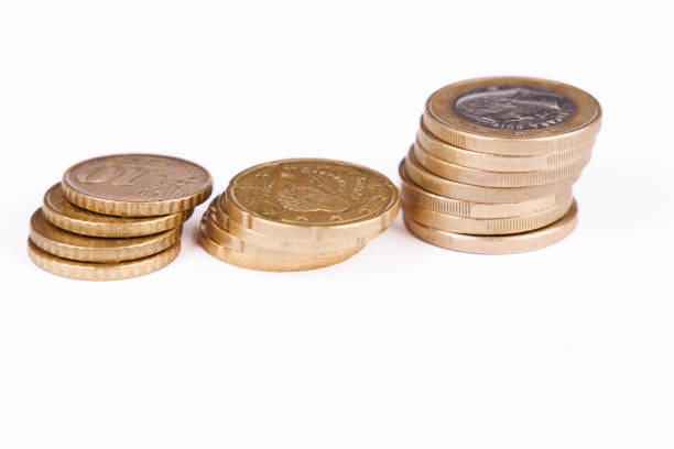 istock Three Rows of Euro Coins of Different Values on a White Background 2186919820