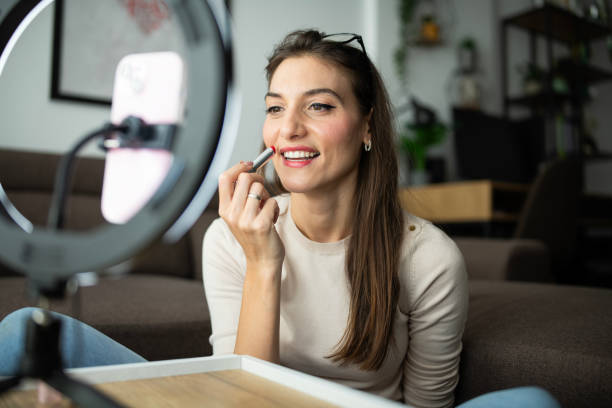 istock Smiling female influencer doing a vlog post at home. 2186920304