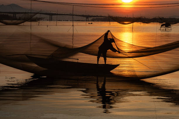 Photos taken in the mornings of fishermen by the beach when the sun rises, so beautiful. Photo taken at Thai Binh beach on June 28, 2020