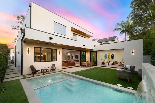 istock Modern luxury home with pool at sunset. 2186926449