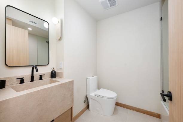 istock Modern minimalist bathroom interior with beige tones. 2186926539