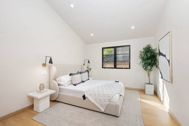 istock Modern minimalist bedroom with neutral tones. 2186926545