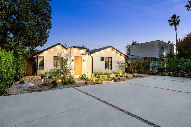 istock Modern house with illuminated facade at dusk. 2186926560
