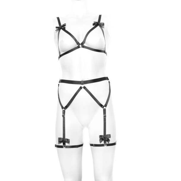 istock harness bra costume and garter belt in black on a white on a light background 2186928047