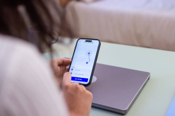 istock Woman using navigation app on smartphone to find city center 2186928049