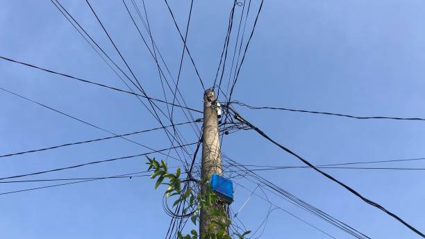 istock electric poles with many branching wires 2186929876