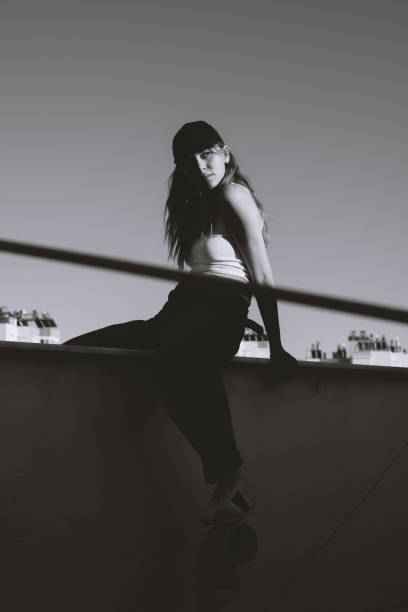 istock Young Woman on Rooftop 2186930535