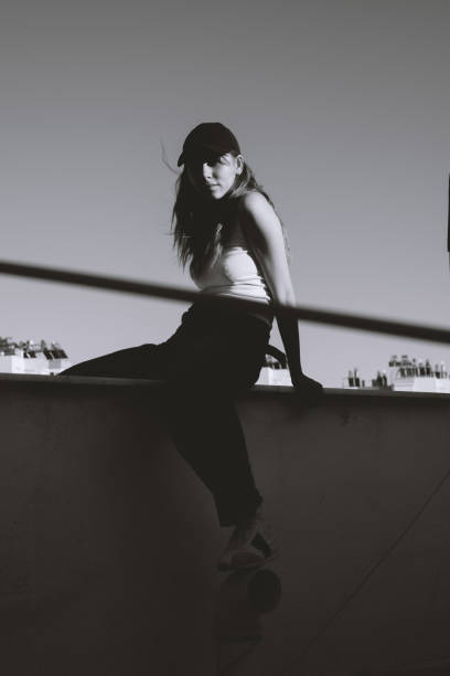 istock Young Woman on Rooftop 2186930542
