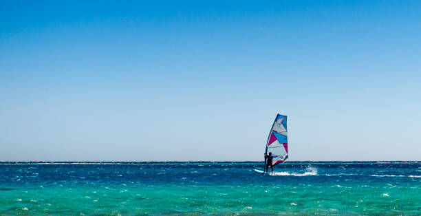 istock one surfer rides in the Red Sea in Egyp 2186932438
