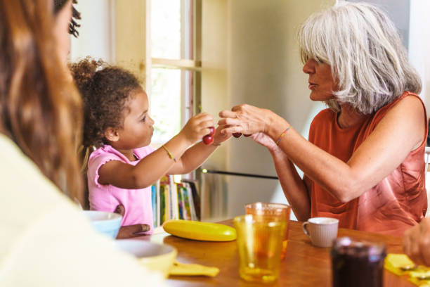 istock Generational Connect: Toddler and Grandparent at Breakfast 2186932502