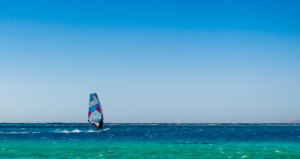 istock one surfer rides in the Red Sea in Egyp 2186932518