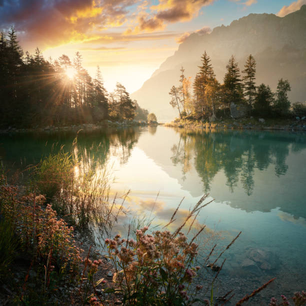 istock Idyllic lake at sunrise, a picturesque scenery at Eibsee 2186937882