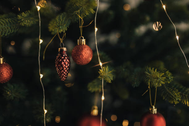 istock Christmas tree with festive lights in a cozy living room. 2186939509