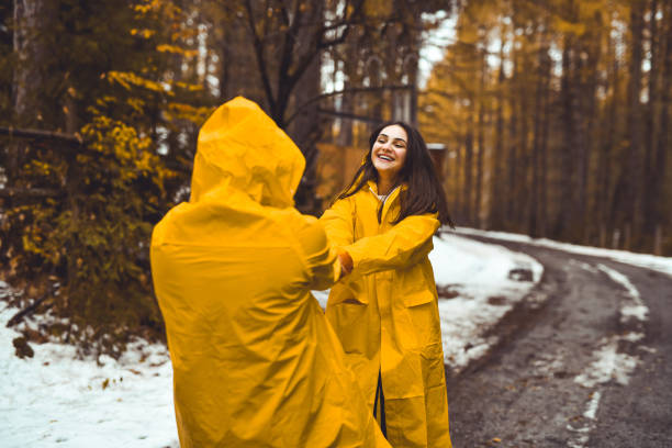 istock Female Pulling Boyfriend Towards Her With Both Hands Convincing Him to Go in Her Direction 2186949127