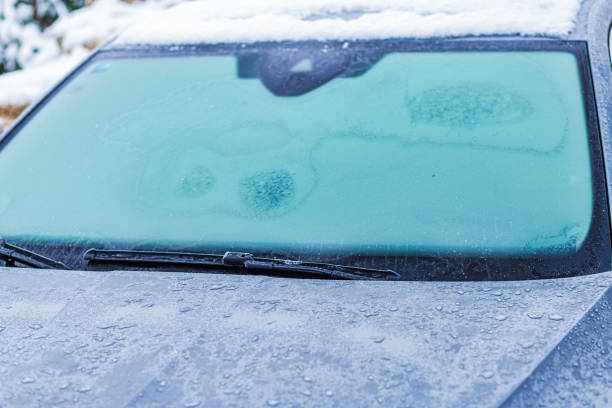 istock Frosted Car Windshield on a Snowy Winter Morning With Ice 2186949940