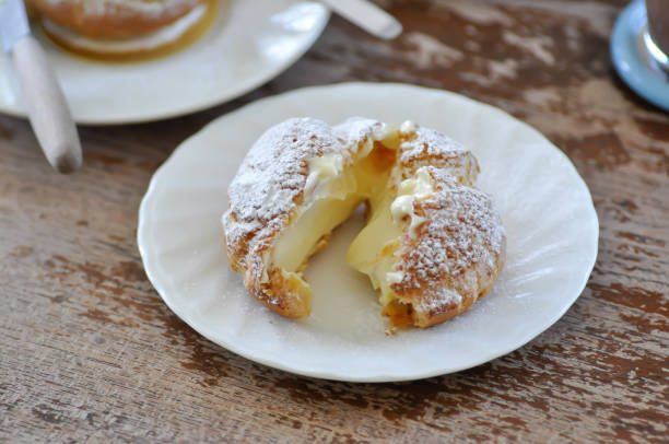 istock choux cream or cream puff, eclair in a small dish 2186950363