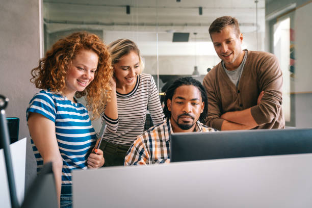 istock Business solutions, technology and strategy concept. Colleagues working and brainstorming in office 2186954315