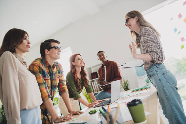 istock Photo of nice young people training discussion boss comfortable modern office loft room interior indoors workspace 2186959846