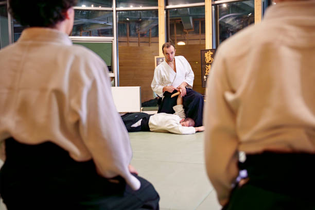 istock Martial Arts Practice with Wooden Bokken in a Dojo 2186960664