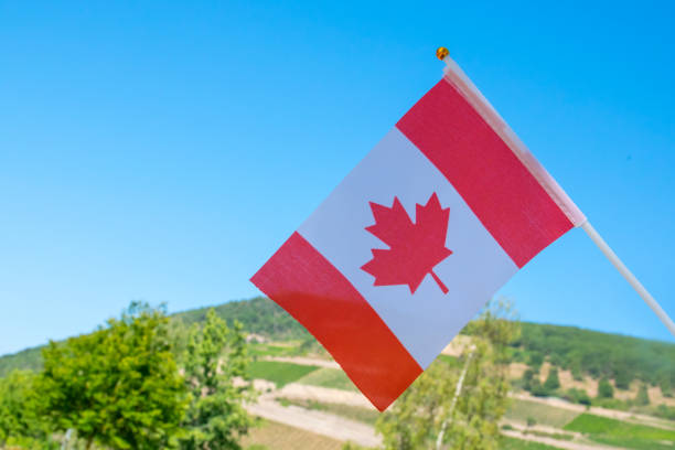 istock Canada national flag on the sky. Nature background. 2186961947