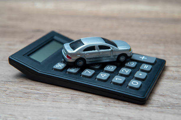 istock A toy car on top of a calculator. 2186962389