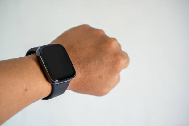 Black smartwatch in man hand