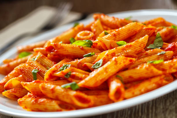 istock Pasta with tomato sauce and parmesan 2186977357