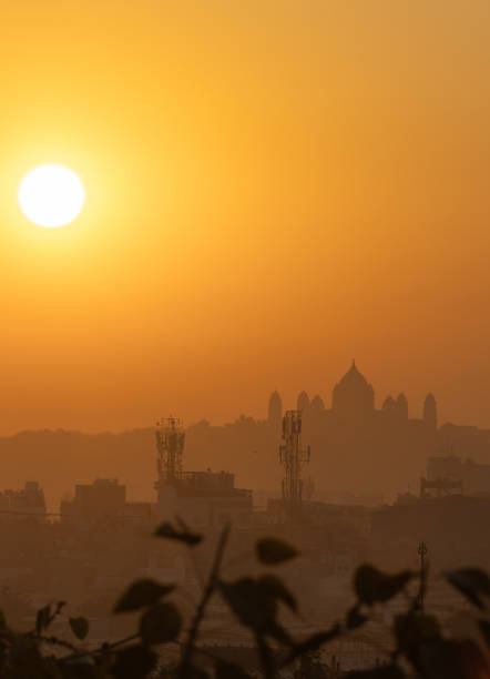 sunrise orange sky over city fort shadow at dawn from flat angle image is taken jodhpur rajasthan india.