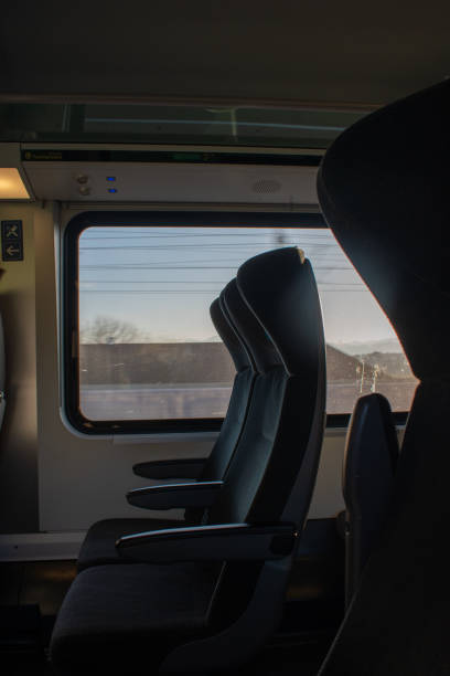 istock Interior of a high-speed modern train. Seats, window view on a train. 2186978380