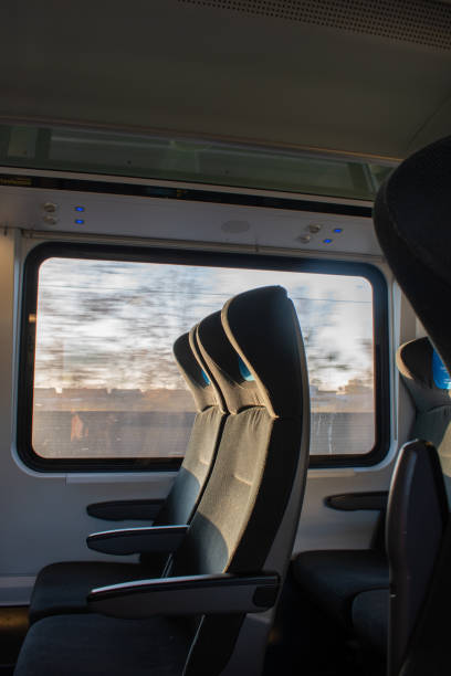 istock Interior of a high-speed modern train. Seats, window view on a train. 2186978393