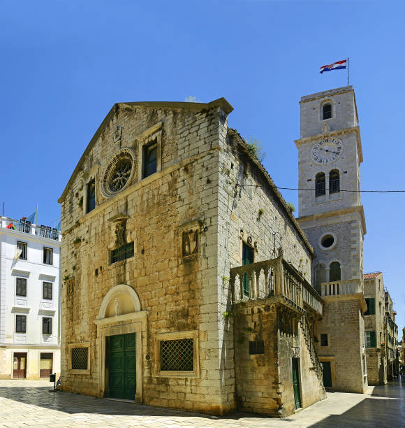 Sibenik - Ivan Pavel II. square and St. Ivan's Church. The old town belongs to the architectural treasures of Dalmatia, Croatia