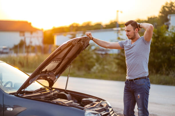 istock Mid-Adult Man Feeling Frustrated While Having Car Problems And On The Street 2186981673