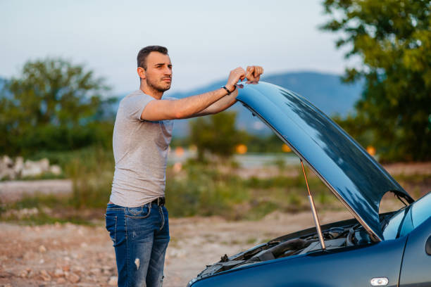 istock Mid-Adult Man Feeling Frustrated While Having Car Problems And On The Street 2186981732