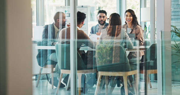 istock Glass, project or business people meeting with group for feedback or discussion or teamwork. Corporate report, staff or manager talking to professional employees for news, advice or planning together 2186986012