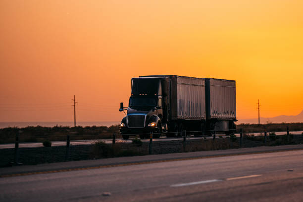 istock Semi Truck pulling a Double Cargo Trailer 