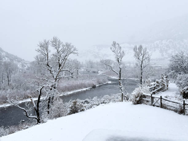 istock Snowstorm and Winter View of River 2186988420