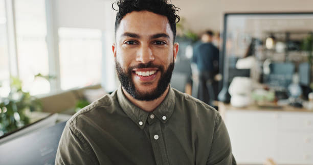 istock Portrait, man and programmer with smile in office of web development, software maintenance and coding. Male developer, confidence and computer for system update, application script and project safety 2186989170