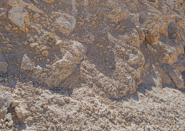 istock Background of stones on sand 2186989382