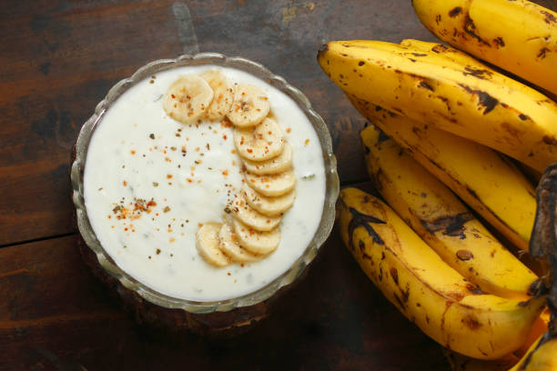 Close-up of a partially peeled banana, revealing its soft and edible interior
