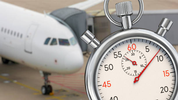 istock Stopwatch in front of a passenger plane 2186994375