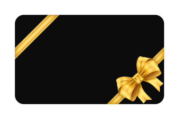 istock Mockup black gift card with two diagonal gold ribbon and  bow isolated on white background 2186997428