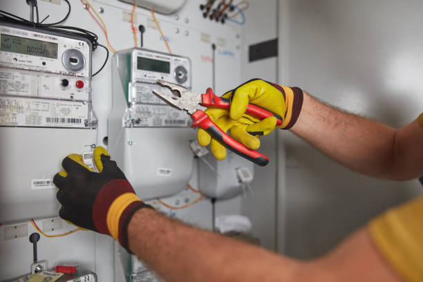 istock Technician working on a modern electricity power meter station in a building. 2186998818