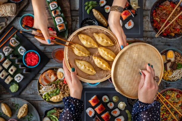 istock Gyoza jiaozi dumpling in the bamboo steamer 2186999883
