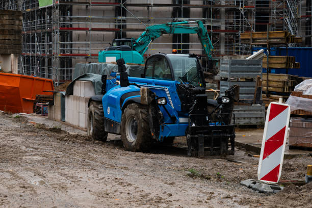 istock Heavy machinery working at a construction site during day 2187000429