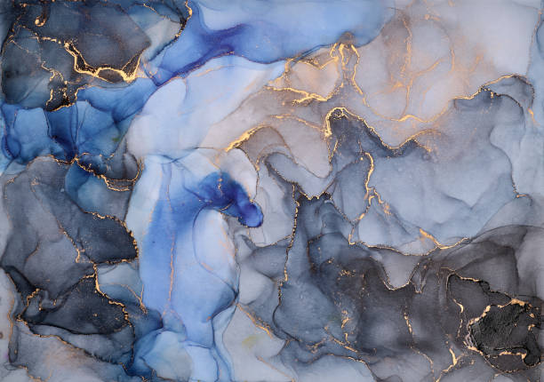 istock Snaking rivers of metallic gold weave through  vibrant interplay of soft and bold tones. Movement and balance in nature, crafted in the fluid ink technique to create seamless transitions  rich texture 2187001775