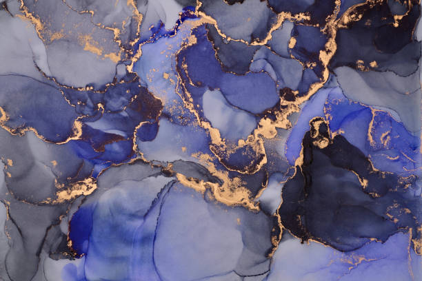 istock Flowing shapes and delicate metallic touches, abstract artwork on together rich tones and golden highlights. The liquid ink technique create fluidity, feeling of depth,  beauty 2187001820