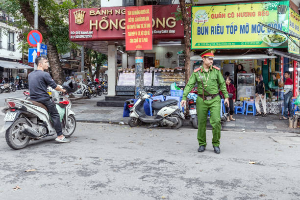 Hanoi, Vietnam - March 20, 2024: Policeman on the street in the centre of Hanoi